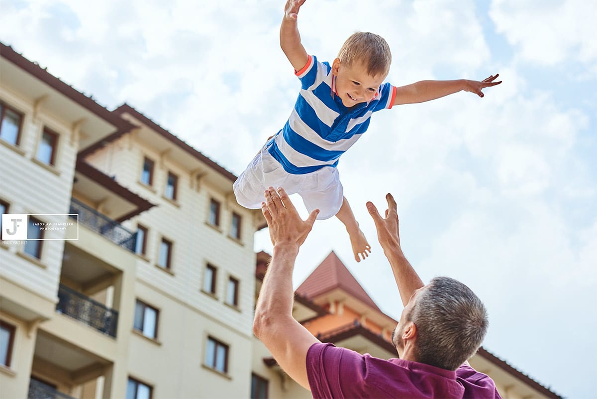 Father Throws Baby in the Air